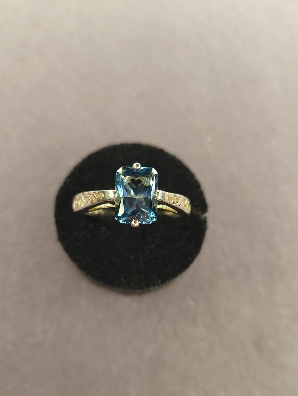 Blue Topaz Rectangular Solitaire Ring in Gold